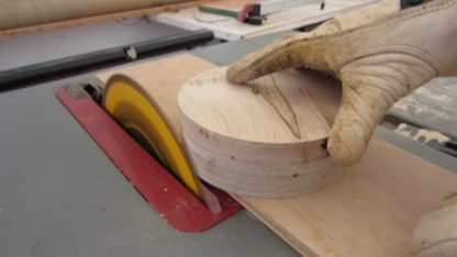 Cutting a wood back roller.