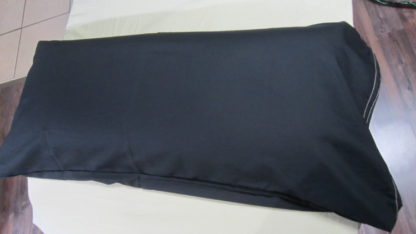 32" wide massage knee ankle bolster with organic cotton case. Black.