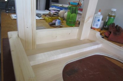 Squatting toilet platform legs fully glued in.