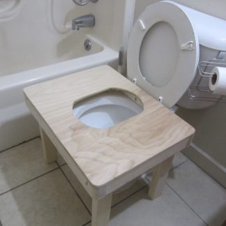 Squatting toilet platform for people that like a full squat over toilet bowl. Like in India!