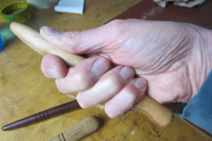 Hand carved massage stick fits perfectly in your hand.