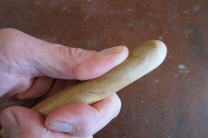 Danish massage stick blunt end.