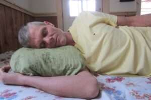 Millet pillow designed specifically to support side sleepers’ neck and shoulders comfortably.