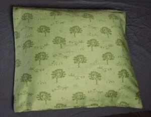 Millet husk pillow filled with natural millet husks and covered in soft cotton fabric.